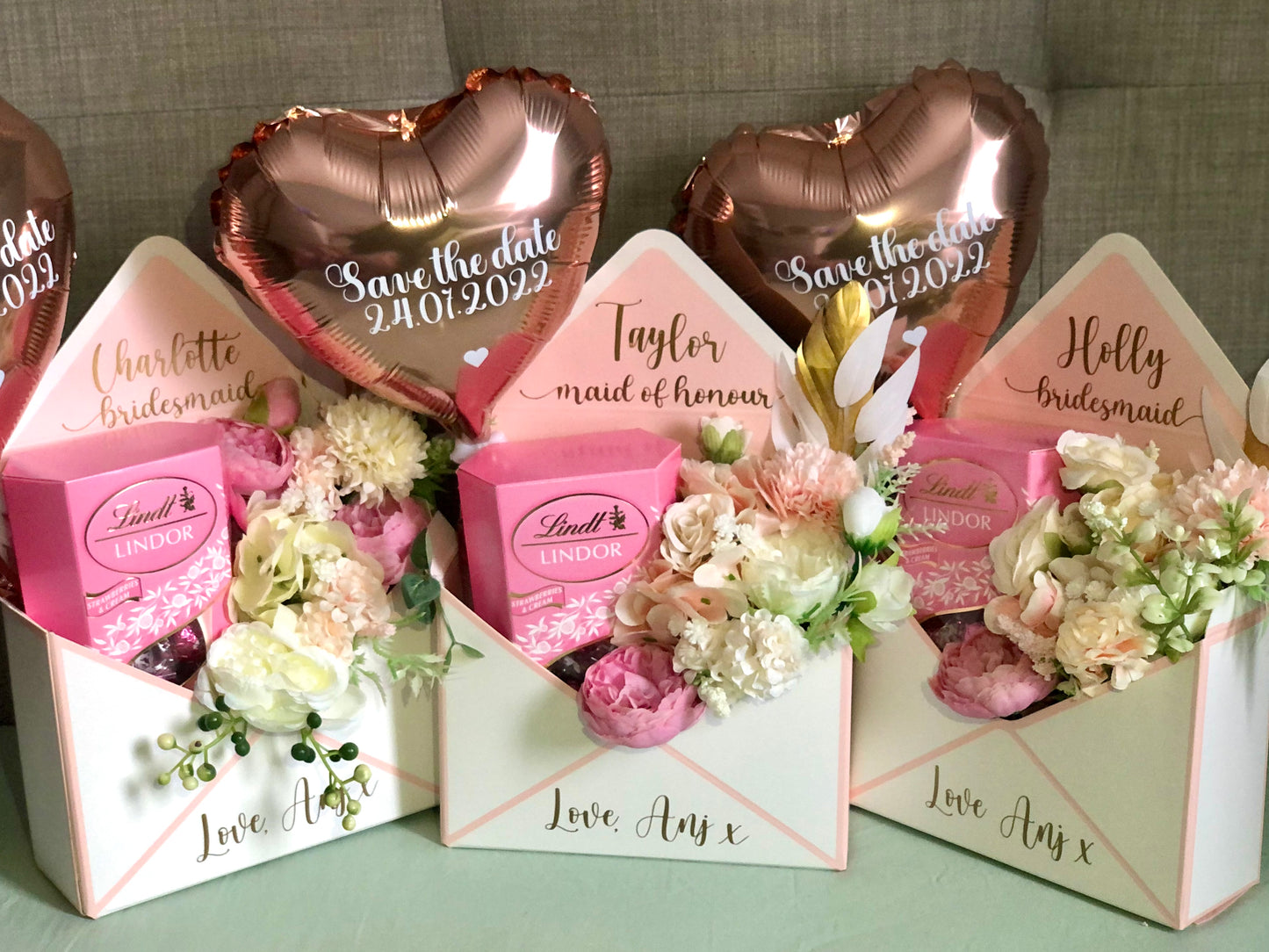 Envelope with flowers, chocolate & balloon